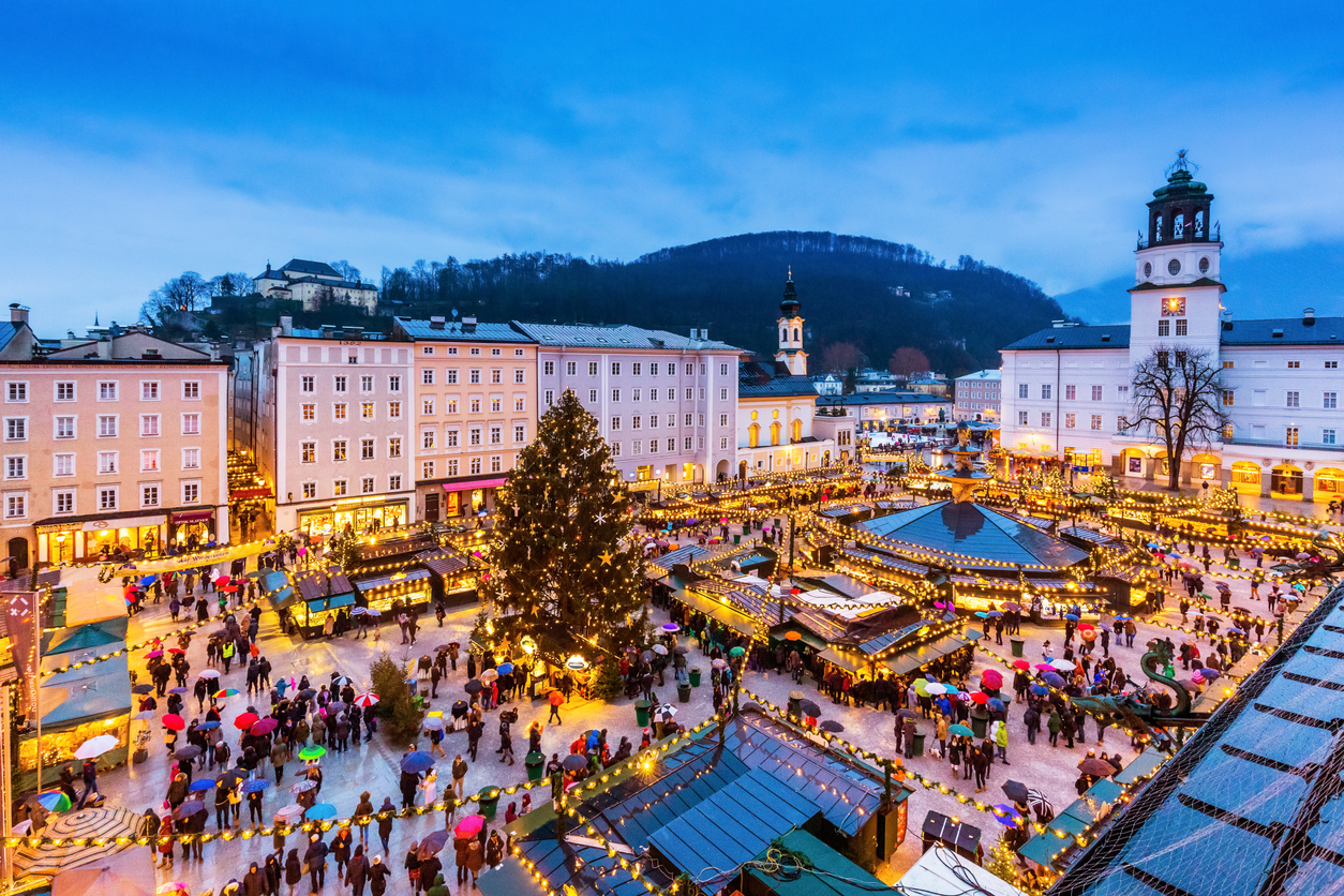 Salzburg, Austria: December 23, 2018 - Old Town Christmas Market at twilight.